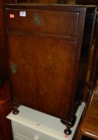 Lot 1344 - A pair of 1950s simulated walnut bedside...