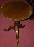 Lot 1323 - A George III style elm occasional table having...