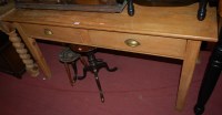Lot 1325 - An early 20th century pine kitchen table...