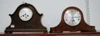 Lot 2 - An Art Deco walnut cased mantel clock, having...