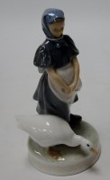 Lot 12 - A Royal Copenhagen model of a girl with goose...