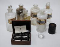 Lot 14 - A small collection of assorted apothecary jars,...
