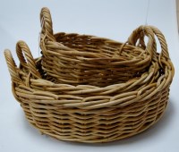 Lot 53 - A graduated set of three wicker twin handled...