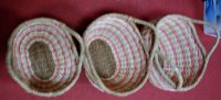 Lot 56 - A graduated set of three multicoloured wicker...