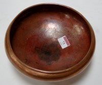 Lot 73 - An Arts & Crafts hammered copper shallow bowl,...