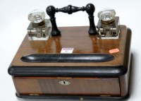 Lot 82 - A Victorian walnut and ebonised desk stand...
