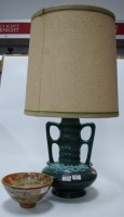 Lot 96 - A 1970s green glazed twin handled pottery lamp...