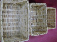 Lot 122 - A graduated set of three rectangular wicker...