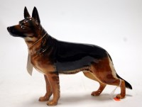 Lot 134 - A Goebel porcelain model of an Alsatian in...