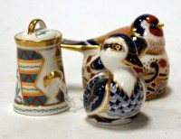 Lot 145 - A Royal Crown Derby Goldfinch nesting desk...