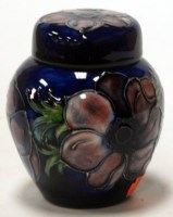 Lot 147 - A small Moorcroft jar and cover, in the...