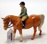 Lot 161 - A Beswick figure of a boy on pony, model...