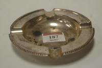 Lot 187 - A George V silver ashtray, of circular form,...
