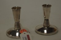 Lot 195 - A pair of modern silver dwarf table...