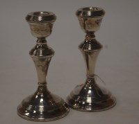 Lot 200 - A pair of modern silver dwarf table...