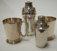 Lot 230 - Two large plated tankards, each stamped LMS...