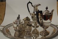 Lot 231 - An early 20th century silver plated five piece...