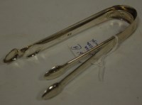 Lot 254 - A pair of 19th century silver sugar tongs,...