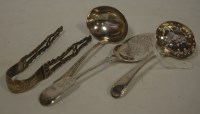 Lot 271 - A Victorian silver sifting spoon, probably...