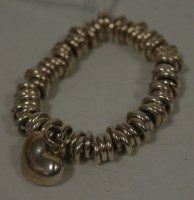 Lot 282 - A Links of London silver bracelet with heart...