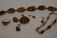 Lot 295 - A collection of assorted silver mounted amber...