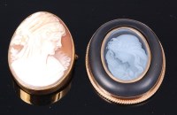 Lot 302 - A carved shell cameo brooch, as a profile...