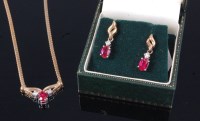 Lot 328 - A ruby and diamond set pendant, on 9ct gold...