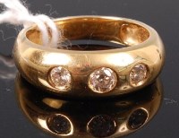 Lot 342 - An 18ct gold and three diamond set ring, as...