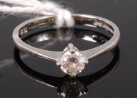 Lot 346 - A platinum diamond solitaire ring, the four...