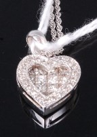 Lot 359 - A modern 14ct white gold and diamond set heart...