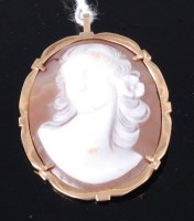 Lot 366 - A carved shell cameo brooch, depicting bust...