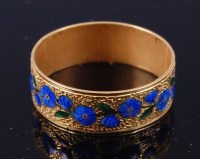 Lot 379 - A ladies yellow metal band ring, inset with a...