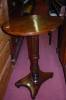 Lot 1418 - A mahogany oval fixed top pedestal tripod...