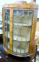 Lot 1426 - An Art Deco figured walnut ledgeback bowfront...