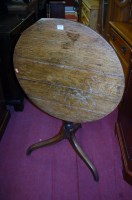 Lot 1439 - An early 19th century provincial oak circular...