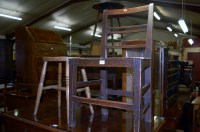 Lot 1442 - A circa 1800 provincial elm panelled seat...