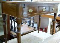 Lot 1182 - A 19th century mahogany three drawer writing...
