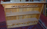 Lot 1184 - A modern pine two tier dresser rack having six...