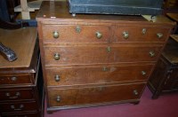 Lot 1190 - An early 19th century oak square front chest...