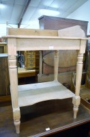 Lot 1195 - A pine three-quarter gallery back two-tier...