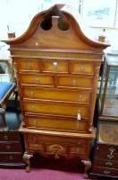 Lot 1210 - A reproduction American cherrywood chest on...