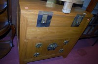 Lot 1219 - A contemporary Eastern teak and metal bound...