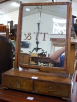Lot 1221 - A 19th century flame mahogany swing mirror...