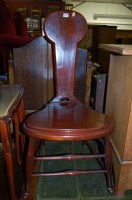 Lot 1224 - A stained wood panelled seat single hall chair