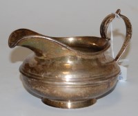 Lot 196 - A William IV silver cream jug, of squat...