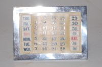 Lot 197 - A George V silver framed perpetual desk...