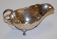 Lot 211 - An Edwardian silver sauceboat, of plain...