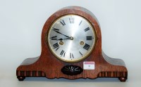 Lot 9 - A 1930s oak cased mantel clock having a...