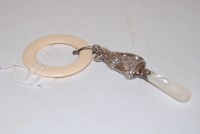 Lot 243 - A mid-20th century childs teether, having...
