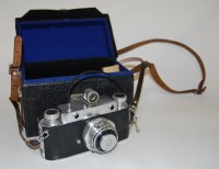 Lot 274 - A mid 20th century camera stamped to the body...